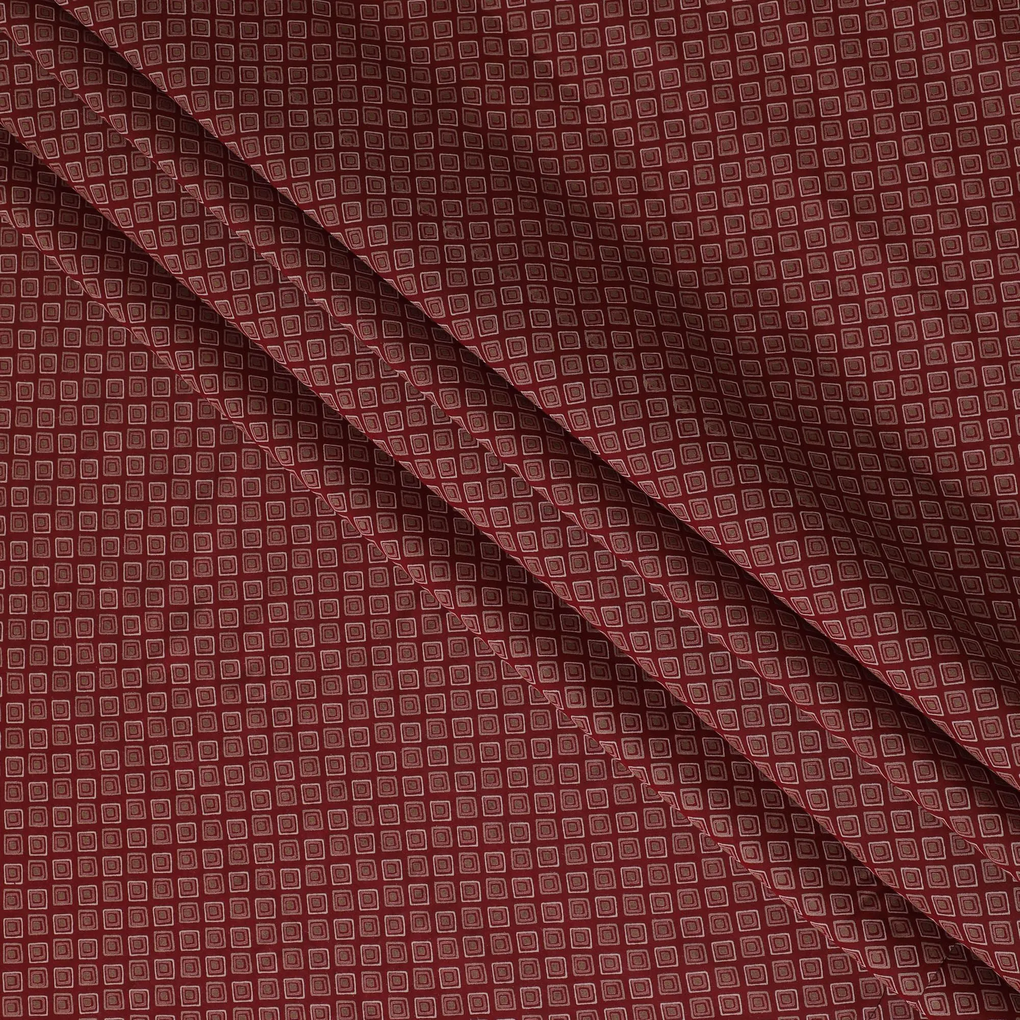 Maroon Synthetic blended  cotton fabric with beige, brick red and pale brown print in geometric design-D16737